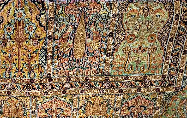 Détail d’un décor de jardin sur un tapis persan.